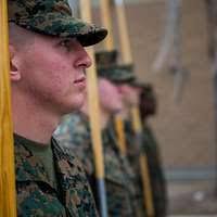 Cpl. Robert James programs an AN-PRC 119F field radio