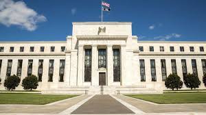 (us, derogatory, slang) a federal government officer or official, especially fbi, cia, nsa, atf, and dea agents. The Federal Reserve Cites Improving Economy Sign It May Cut Support