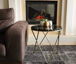 The golden leaf round coffee table represents a blend of modern style and superior craftsmanship. Black Marble Side Tablebrass Coated Table Legs Round Marble Etsy Black Marble Side Tables Marble Side Tables Marble Top End Tables