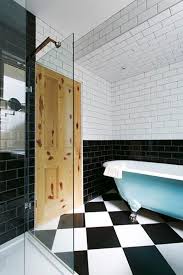 Black And White Checkered Bathroom Floor Tiles Get A Classic Black White Checkered Floor On Any Budget White Bathroom Interior Black Bathroom Black Subway Tiles