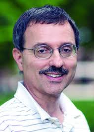 Professor killed in home invasion was stabbed dozens of times