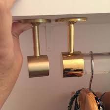 This heavy preloaded duty bracket with anchor and pin easily mounts to closet side walls to support fixed closetmaid&#174; Standard Rod End Bracket Acrylic Rod Brass Curtain Rods Closet Rod Bracket