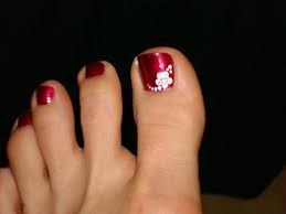 On the same nail, add a rhinestones design. Flower Design Pedicure Flower Toe Nails Toe Nail Designs Toe Nail Flower Designs