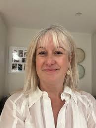 Is it possible to be employed by a NZ company while living in Brisbane?