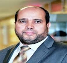 Dr. Bashir Atteia (2nd from left) with his Cell Biology Lab students,  extracting anthocyanins from red cabbage and using the ext