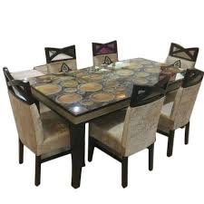 It is white in color with a polished texture and has a good contrast with the black wrought iron chairs. Glass Designer Wooden Dining Table Set Rs 35000 Set H S Furnishers Id 20568656688