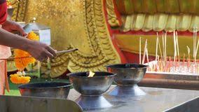 If it's a solid stick you can light either end. People Light Incense Sticks With Smoke In Buddhist Temple Thailand Pattaya Stock Video Video Of Meditation Chinese 110482891