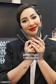 Jackie Cruz poses for a photo with her brother Eric Infante during... News  Photo