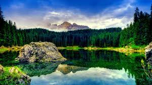Browse 2,661,765 peaceful water stock photos and images available, or search for meditation or spa to find more great stock photos and pictures. Blue Sky With White Clouds The Green Pine Trees Rocks Peaceful Lake Reflection In Water Beautiful Hd Wallpaper Wallpapers13 Com