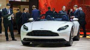 The styling is more conservative (but i love it), the interiors more luxurious, and the performance typically isn'. Aston Martin Tries To Copy Ferrari S Stock Market Momentum Robb Report