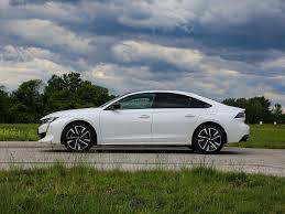 Calandre à damier chromé et contour chromé. Peugeot 508 Gt Hybrid 225 E Eat8 Testbericht