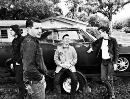 With that new era comes with a new image, and we got a quick peek at this era's look yesterday when the band updated their website with a fresh band logo. Arctic Monkeys Am