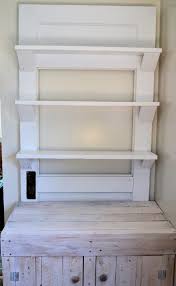 Today i am showing off my corner shelf made from an old door. Vintage Door Use As Display Shelving