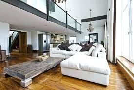 In an open floor plan space, make the sitting area feel like its own separate hangout zone by turning it into a sunken family room, i.e. Living Room Layout Open Floor Plan Home Design Ideas