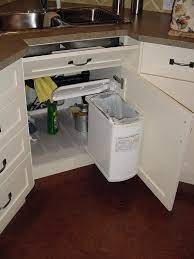 Offering easier access to items, under sink drawers are a great way to maximise storage in this tight space. Unique Undersink Trash Can Ideas Tags Undersink Trash Can Cabinet Doors Undersink Trash Can Clean Kitchen Sink Design Kitchen Storage Hacks Kitchen Storage