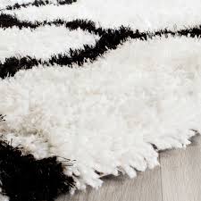 With an irresistibly soft pile and wonderful palettes, it brings warmth to every decor. Barcelona Shags Black White Shag Rug Safavieh Com