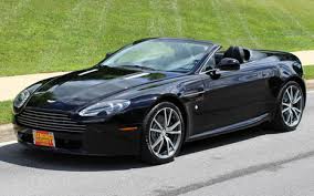 Image result for Jet Black 2010 Aston Martin