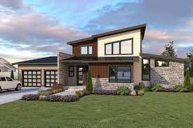 Plan 280035jwd Efficient Modern Home Plan With Drive Through Garage Modern House Plans Modern Style House Plans Modern House Exterior