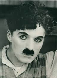 Chaplin's childhood was fraught with poverty and hardship, making his eventual trajectory the most dramatic of all the rags to riches. Is It Just Me Or Does Charlie Chaplin Look Like A Woman I Looked At The Pic And Thought It Was A Wo Charlie Chaplin Charles Spencer Chaplin Silent Film