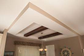 Vaulted ceilings require more maintenance, especially if you've decided to include exposed beams or fans, which can be difficult to clean and repair. Tray Ceiling With Beams Modular Homes By Manorwood Homes An Affiliate Of The Commodore Corporation