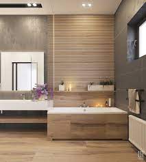 A small modern bathroom outfitted with white subway tile and gray penny tile could look pretty plain, but an interesting country sink and round galvanized mirror add an unexpected touch. An Organic Modern Home With Subtle Industrial Undertones Contemporary Bathroom Designs Contemporary Master Bathroom Contemporary Bathrooms