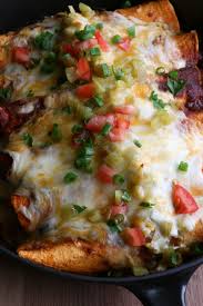 Easy chicken enchiladas recipe with tender pieces of shredded chicken rolled in flour tortillas and topped with a homemade enchilada sauce. Chicken And Black Bean Enchiladas Hip Foodie Mom