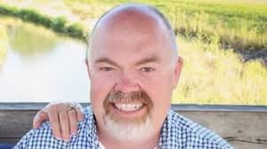 Heath High School athletic director Ellis Booth dies from COVID-19