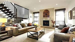 Go futuristic, with colourful clocks that using pops of red and blue upon black and grey, this modern eclectic living room is coloured under baubles. Modern Country Home Interior Design