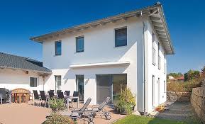 Das Einfamilienhaus Haas Tl 154 Von Haas Haus Vereint Wohnen Und Arbeiten Unter Einem Dach Informieren Sie S Stadtvilla Bauen Stadtvilla Outdoor Dekorationen
