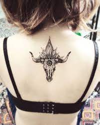Taurus tattoos could be rendered for both men and women. Zodiac Taurus Bull Upper Back Tattoo Taurus Tattoos Bull Tattoos Tattoos For Women