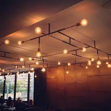 Prestonleedesign On Instagram Loving This Lighting Installation Black And Gold Prestonleedesign Prestonlee Light Installation Lighting Vintage Lighting