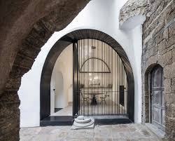 The door has black brushed metal hardware and a bold cream colored house number in an interesting font. Best 60 Modern Doors Metal Design Photos And Ideas Dwell