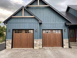 How can you improve your home's appearance with a rustic garage door? Rustic Faux Wood Garage Doors Garage Door Design Carriage House Garage Doors Garage Door Colors