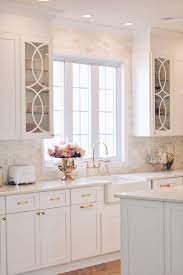There are many benefits to adding glass doors to your kitchen cabinets, the first of which is entirely obvious: Mullion Cabinet Doors How To Add Overlays To A Glass Kitchen Cabinet The Pink Dream