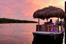 Enjoy delicious tropical cocktails in an island themed decor complete with totem poles and a large thatched roof bar. 2 Hour Private Sunset Cruise On A Tiki Bar Boat In Key West 2021