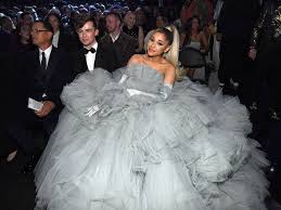 Ariana grande's fans have celebrated her surprise wedding to dalton gomez by sharing throwback photos of the singer in a wedding dress 10 years ago. Ariana Grande Said She S Bidding On The Iconic Midsommar Dress During A24 S Charity Auction And Florence Pugh Gave Her Seal Of Approval Business Insider