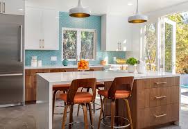 The light reflection emphasizes the openness of the space, even in areas that may have previously felt closed off and dark. Glass Tile Backsplash Ideas To Check Out For Your Kitchen