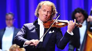 He and his orchestra have turned classical and waltz music into a worldwide concert. Andre Rieu We Want To Hug Each Other And Sing Together And Dance Together