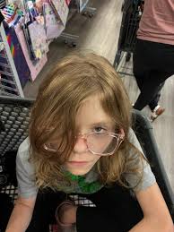 Who is a hairstylist in the south side area available this week for an  11-year-old's hairstyle with hair included?