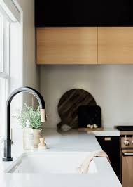 Black And Gold Kitchen Faucet Black Kitchen Faucet Black Kitchen With White Oak Accents Featuring Black And Gold Kitchen F Black Kitchen Faucets Farmhouse Kitchen Design Gold Kitchen Faucet