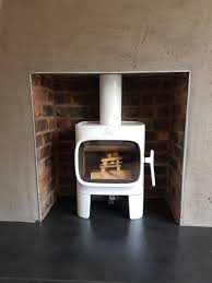 In case bricks need to be cut to fit your unit, please use a masonry saw for best results. The Stove Room On Twitter Love The Jotul F105 In White Enamel Inside A Brick Chamber Installed In Didsbury Jotul Uk Woodburner Hetas Defra Eco Design Norwegian Fireplace Brickwork Enamel Contemporary Manchester Cheshire