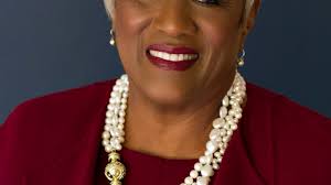 President Dillard delivering keynote address during Harambee Women of  Excellence luncheon