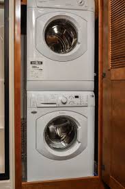 12v usb charging station in dinette area : Take A Look Inside The Landmark 365 Arlington S Master Ensuite Perfect For Full Time Living With Master Ensuite Fiberglass Shower Stackable Washer And Dryer