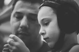 Youth Wrestler Celebrates Win with Dad in Tournament