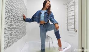 Wetlook girls undress in steamy showers for sensual moments