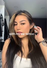 Obsessed with my ear tattoo 🖤 #newtattoo #eartattoo #obsessed