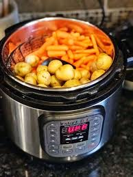 Potatoes And Carrots On Steamer Basket In Instant Pot Instant Pot Pork Chops Instant Pot Pork Instant Pot Recipes