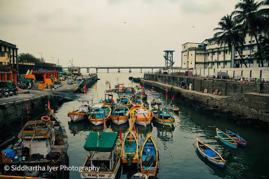 Fishing boats at low tide in Mumbai