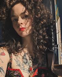 D'mani Thomas is a queer, Black visual theorist, cultural strategist,  spoken word poet and writer from Oakland, California (occupied Ohlone  territory). D'mani has received residencies from SHOW US YOUR SPINES  through Lambda