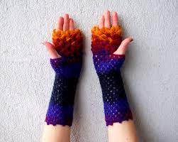 What you need to know. Knitted Fingerless Gloves Turn Your Hands Into Cozy Multicolored Dragon Scales